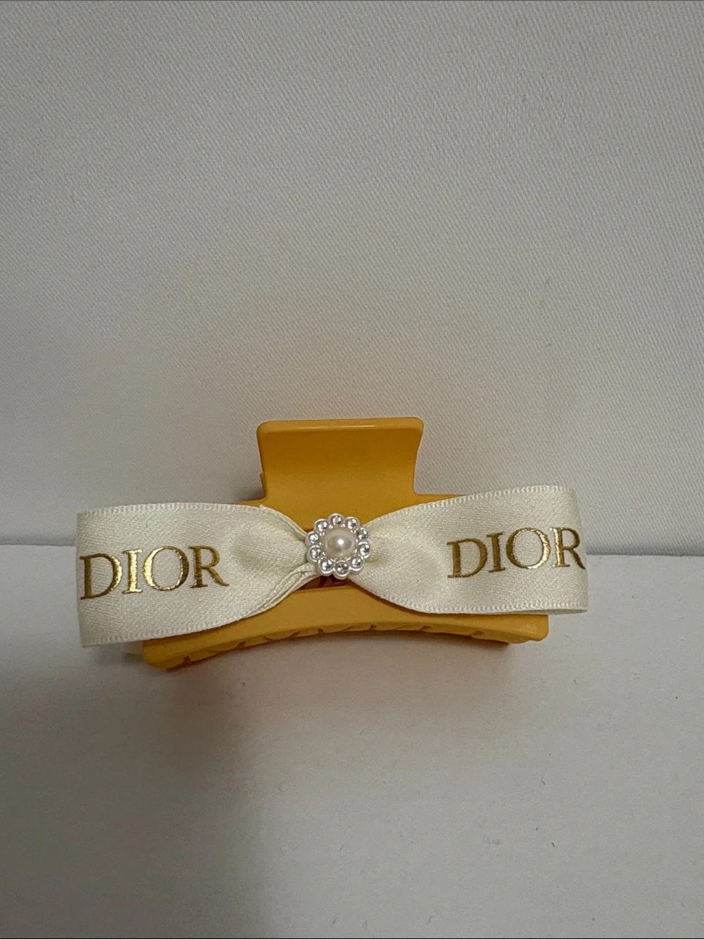 Dior Luxurious white and Gold Ribboned Hair Clip
